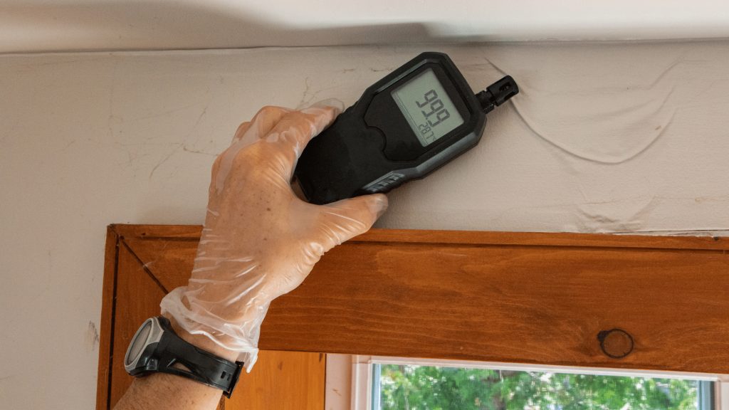 In a well-lit, modern laboratory setting, a variety of air quality monitoring tools and digital displays are showcased on a sleek workbench. In the foreground, an assortment of handheld air quality meters and digital monitors display vibrant readings. The middle ground features an array of professional-grade air sampling kits neatly arranged, with detailed labels indicating their functions. In the background, multiple large monitors with graphs and data visualizations illuminate the space, emphasizing the importance of air quality testing. The atmosphere exudes professionalism and innovation, with soft, ambient lighting creating a focused yet inviting environment. The scene is captured from a slight angle to emphasize the depth and organization of the workspace, all while maintaining a clean, clutter-free aesthetic. Air Quality Test